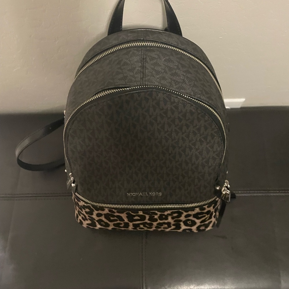 NEW Michael Kors leopard Back pack purse Brand no tags never been used. NEW